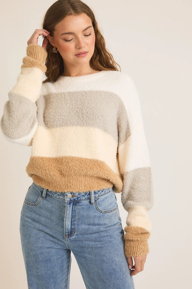 Striped fuzzy round neck color block sweater top paired with blue jeans