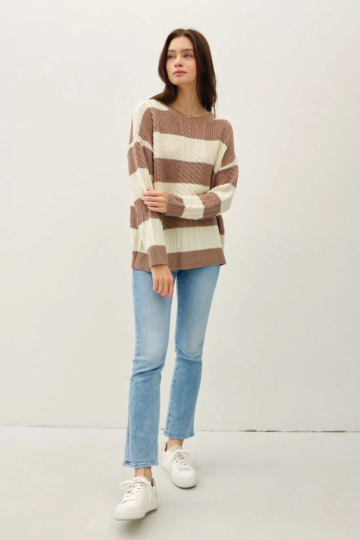 Striped cable knit crew neck sweater in earth tones, perfect for boho, flowy styles