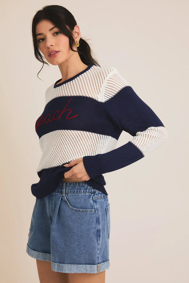 Striped knit sweater with embroidered text in a round neck long sleeve beach stripe design