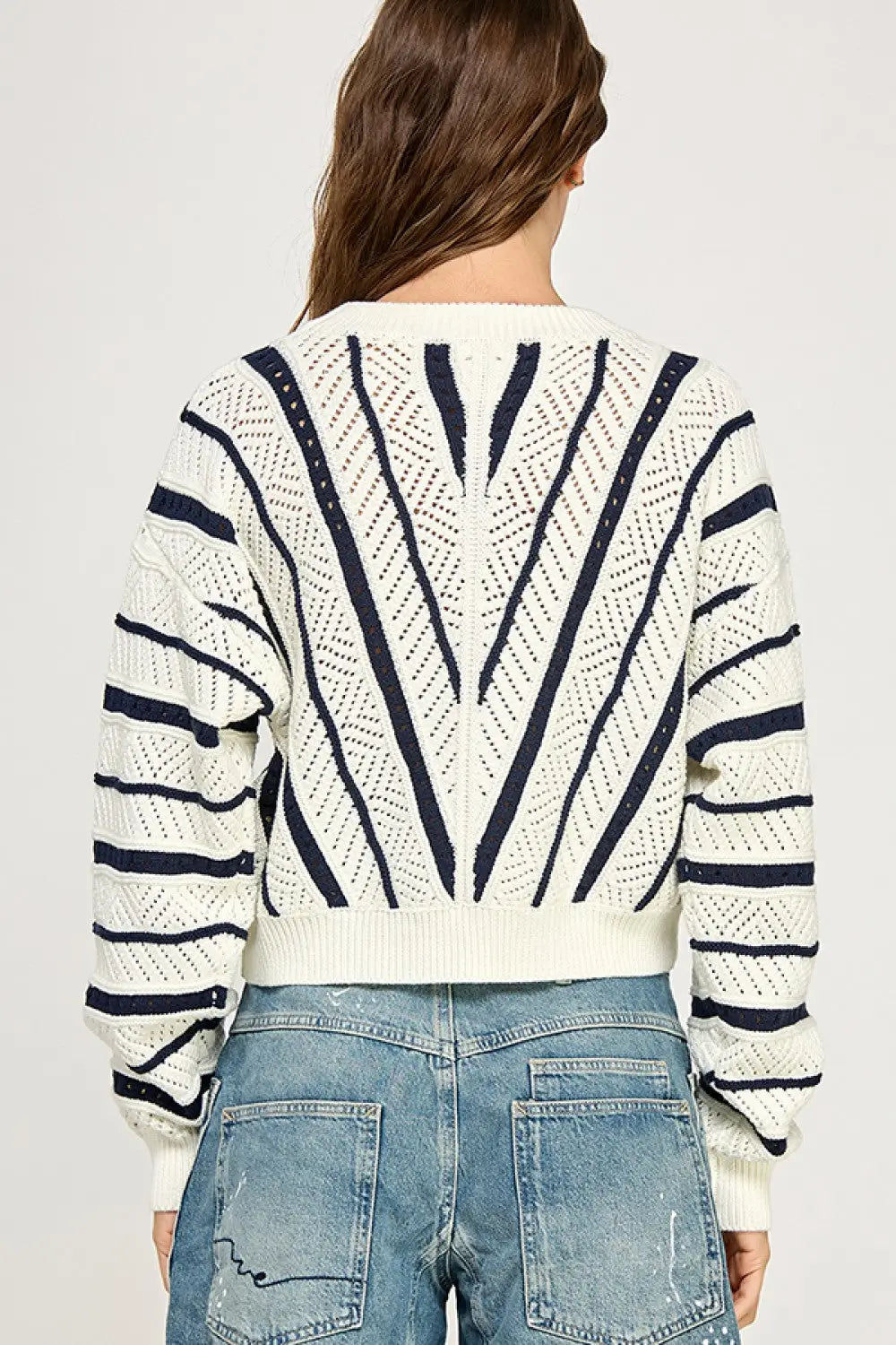 Striped knit sweater from V-STRIPED KNIT SWEATER, perfect for women’s boho chic clothing at Shop Daisy