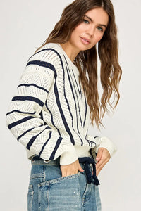 Striped knit sweater from V-STRIPED KNIT SWEATER, perfect for women’s boho chic clothing at Shop Daisy