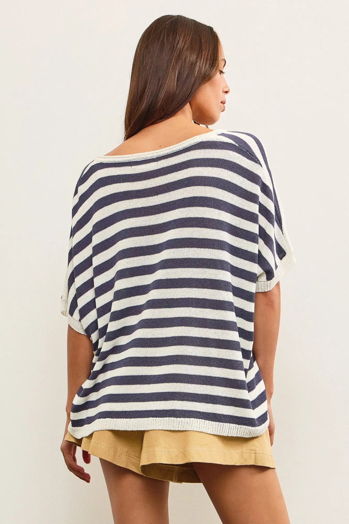 V-neck oversized stripe sweater top featuring stylish knit pattern and relaxed fit