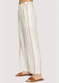 Striped linen straight pants with woven sandals, ideal women’s boho chic clothing from Shop Daisy