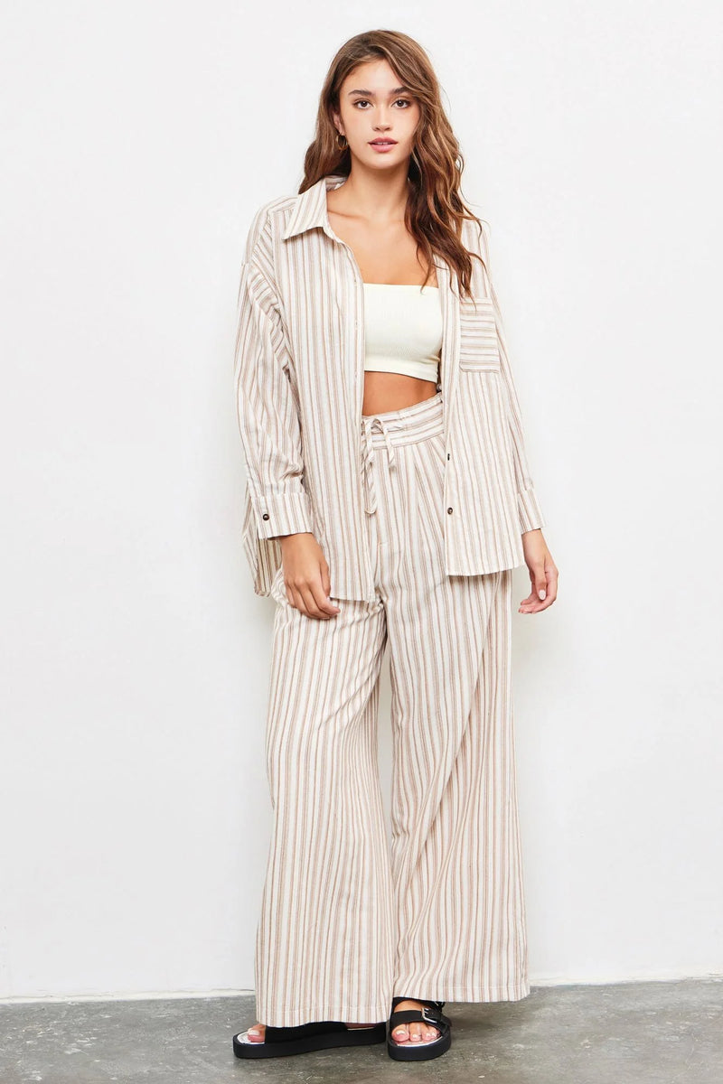 Striped linen pantsuit featuring tied waist band and wide stripe pants with oversized blazer