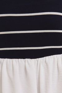 Striped navy and white fabric with gathered white material on woven shorts mix romper