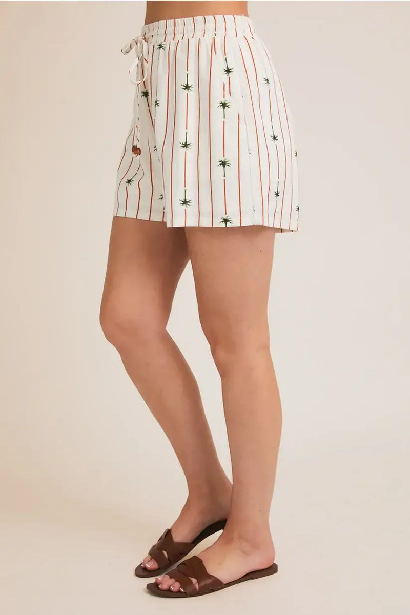 Striped Palm Trees Linen Shorts showcasing tropical palm tree print fabric