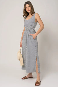 Sleeveless stripe side slit maxi dress with tie waist and elegant side slits