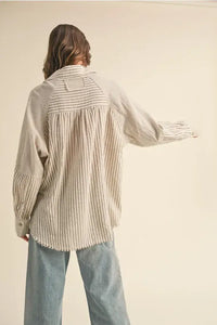 Multi stripe pattern button-down shirt featuring striped and solid color blocks