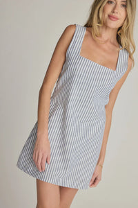 Striped square-neck mini dress from SUNDAY RITUAL DAHLIA LINEN MINI DRESS, perfect for women’s boho chic clothing at Shop Daisy