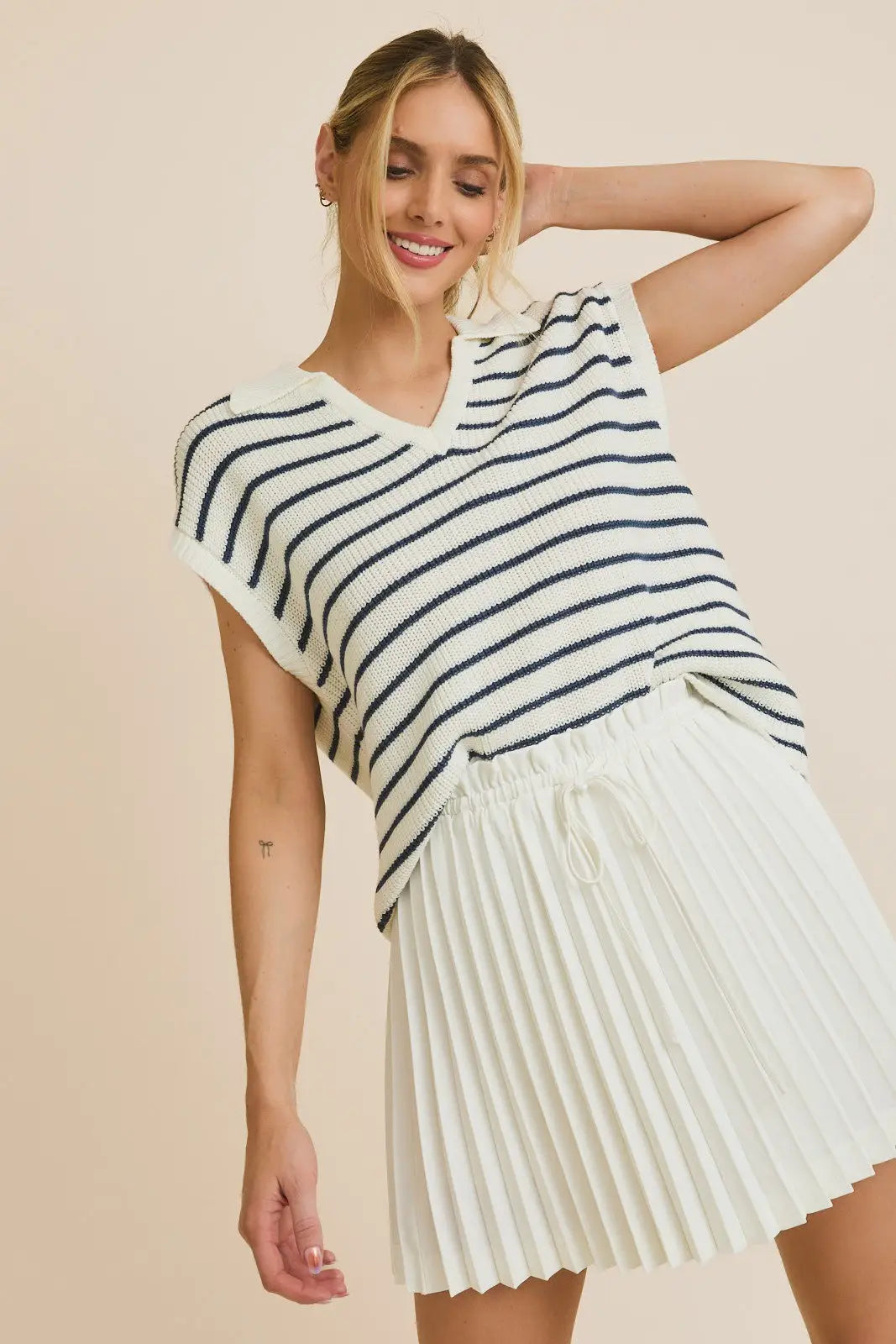 WIDE SHOULDER V NECK STRIPE SWEATER TOP with pleated skirt in stylish ensemble