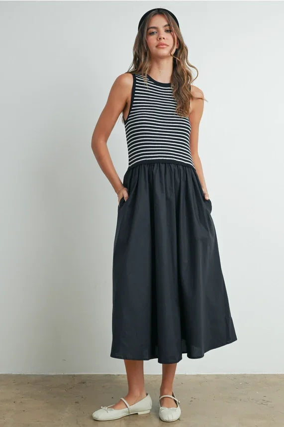 Striped sleeveless maxi dress with black skirt and pockets