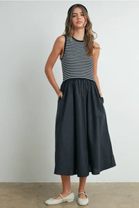Striped sleeveless maxi dress with black skirt and pockets