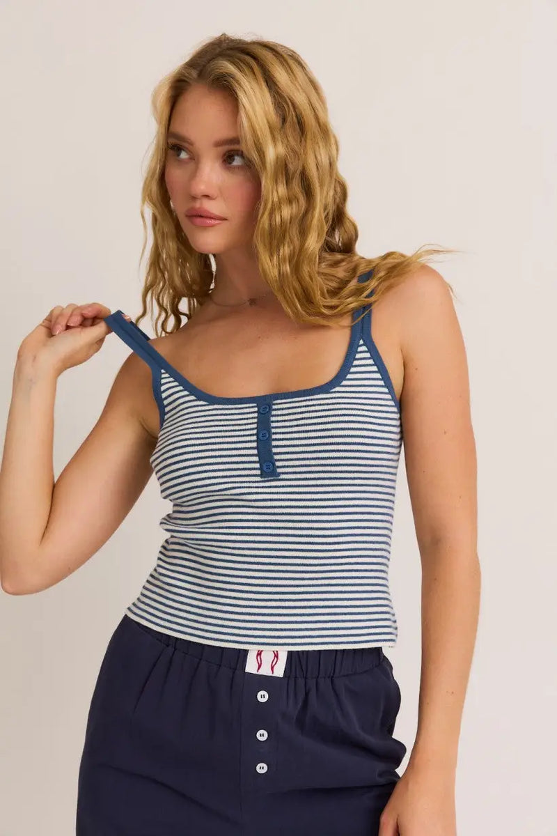 Striped tank top paired with buttoned pants from Shop Daisy for women’s boho chic clothing