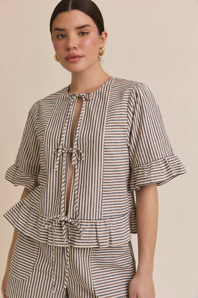 Striped tie-front blouse with short sleeves and ruffle hem design
