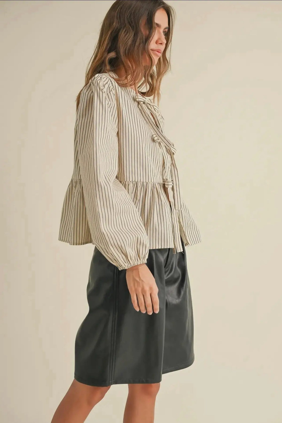 Striped Tie Front Blouse paired with leather shorts, perfect for women’s boho chic clothing