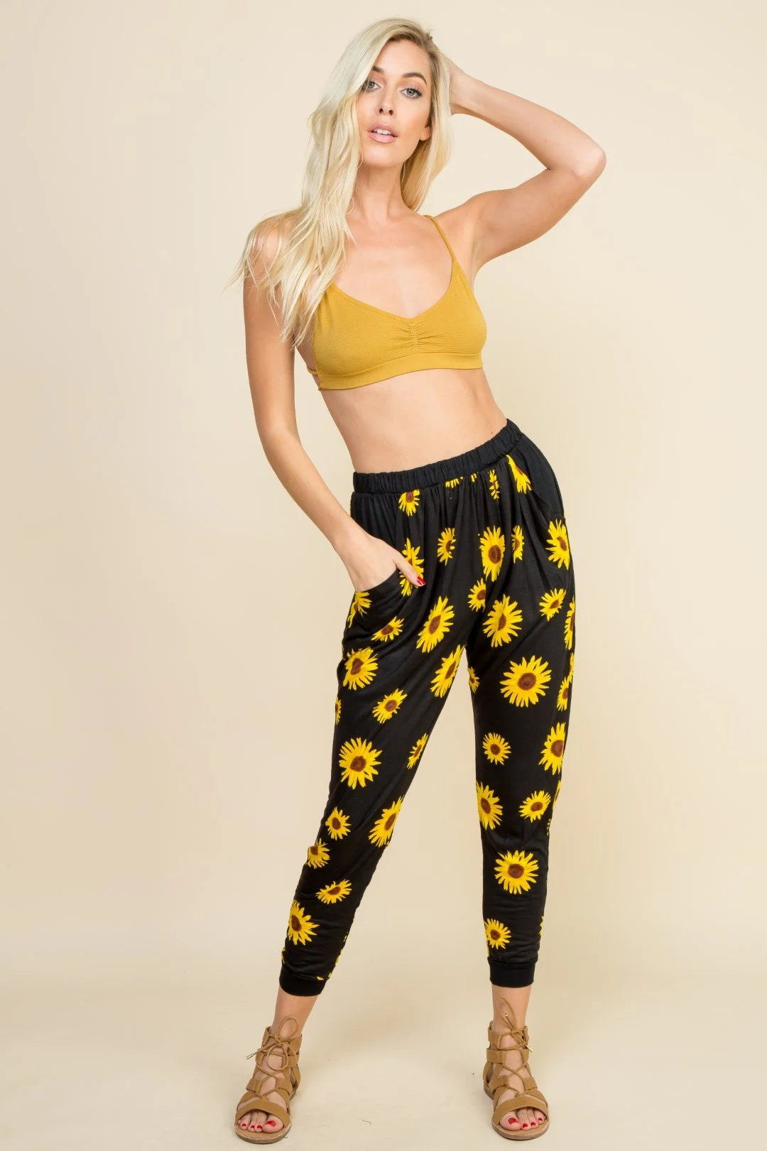 Sunflowers lounge pants in black paired with a Strappy Back Mustard Bralette for effortless chic