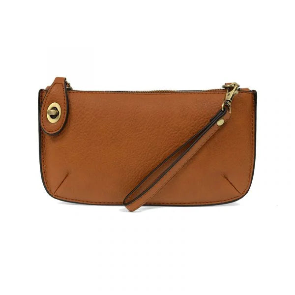 Tan leather clutch purse with gold hardware, ideal for women’s boho chic clothing, shop Daisy