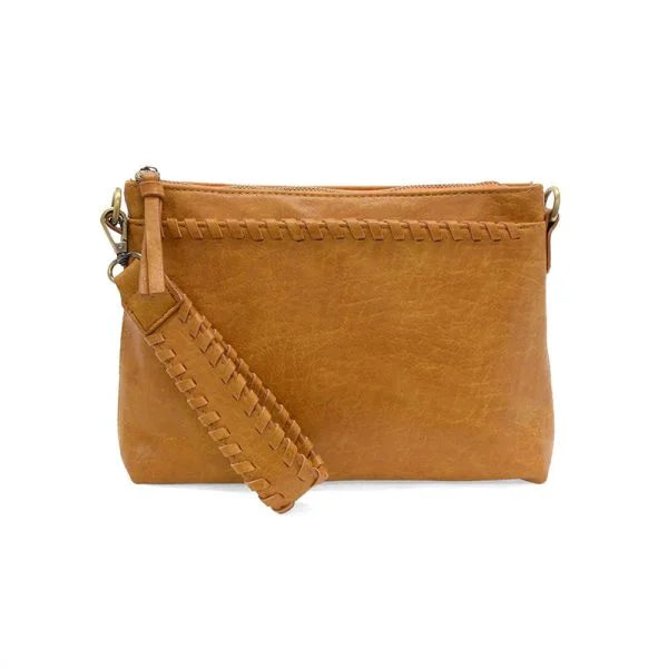 Tan vegan leather clutch with woven wristlet strap and removable shoulder strap