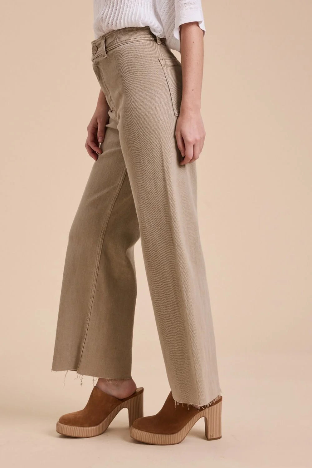 Tan straight wide leg denim pants with frayed hem showcasing stylish wide leg denim fashion