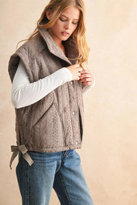 Taupe quilted vest with lace crochet trim and faux fur lining