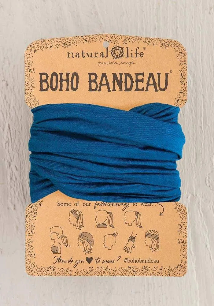 Teal boho bandeau on cardboard display showcasing the stylish teal boho accessory