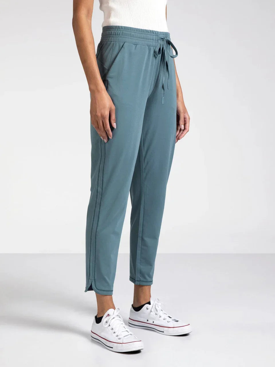 Teal Thread and Supply Harla Pants with white Converse sneakers