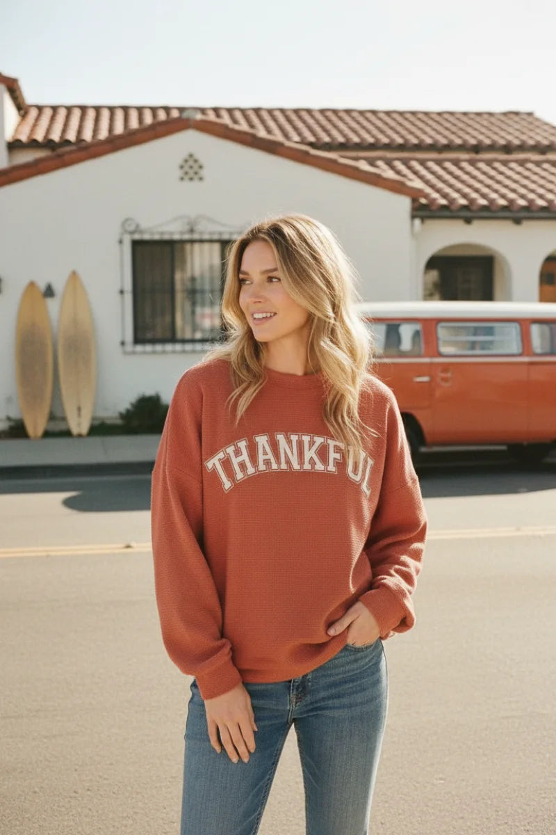 Thankful cloudy knit sweater in terracotta with ribbed cuffs
