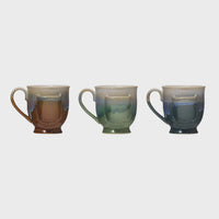 Three gradient ceramic mugs designed for tea bag holders in stylish colors