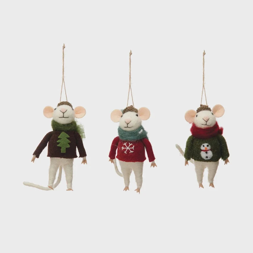 Three wool felt mouse ornaments in festive Christmas sweaters for holiday decor