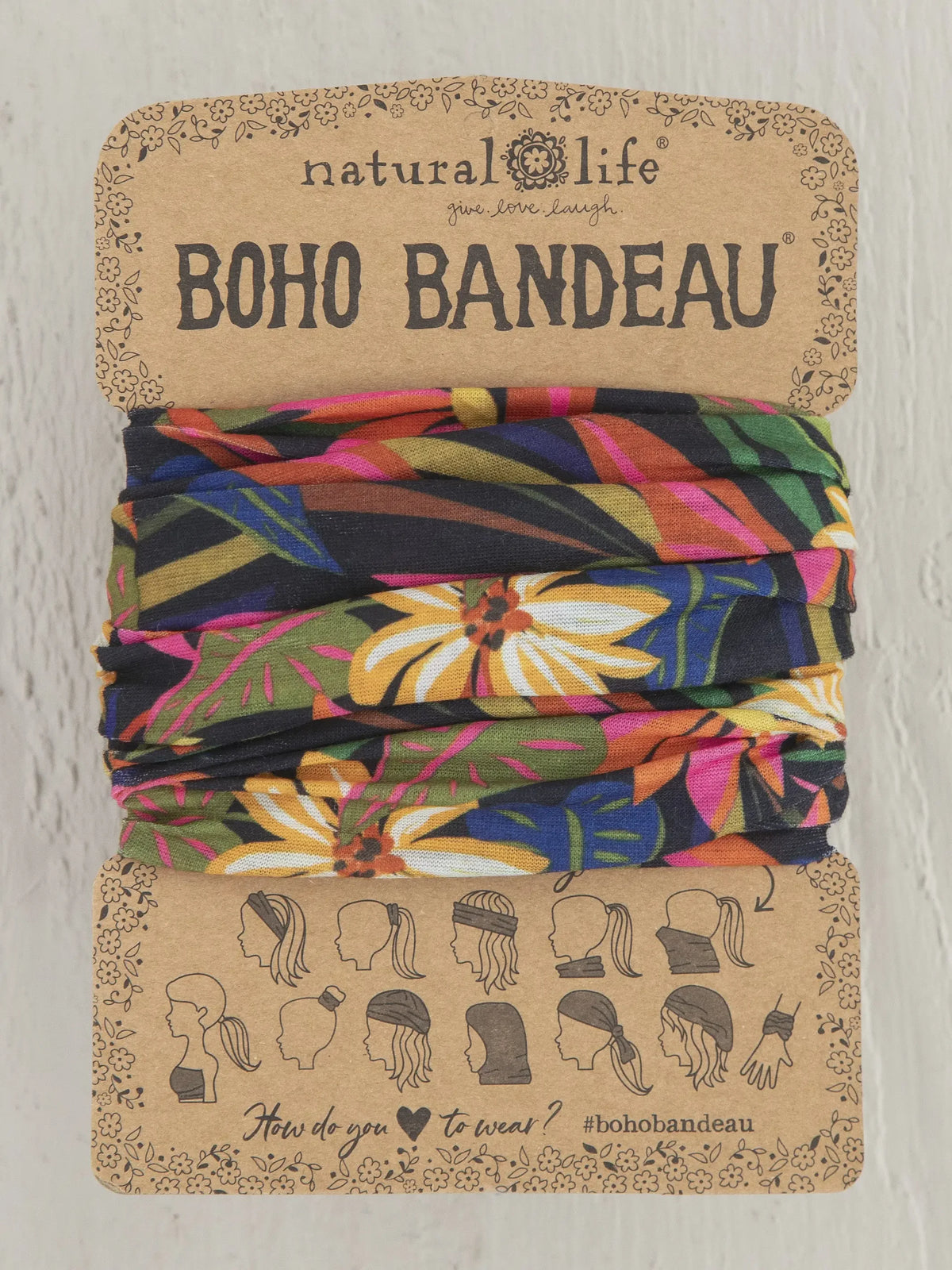 Three fabric hair ties displayed with FULL BOHO BANDEAU HEADBAND - BLACK TROPICAL