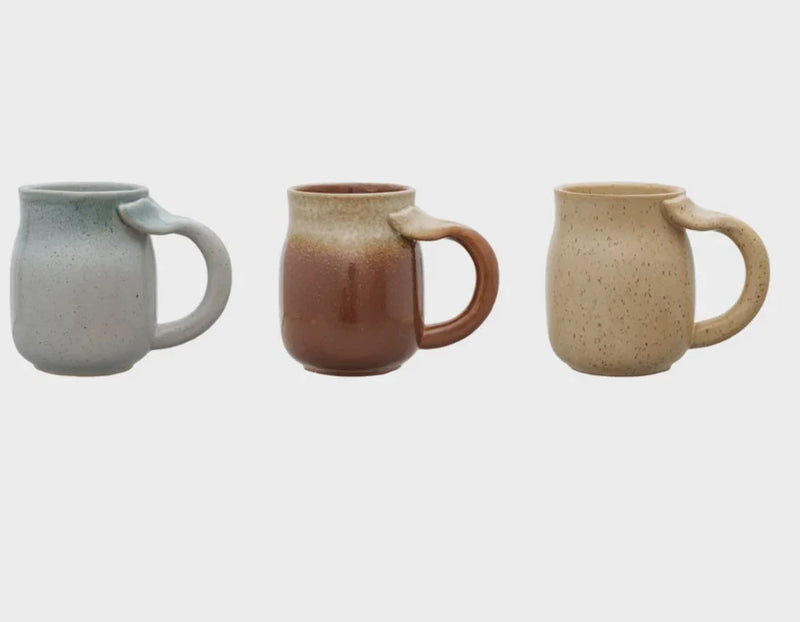 Three colorful Stoneware Mugs featuring a unique Whale Tail Handle design