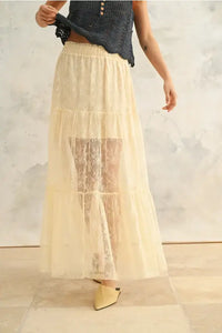 Elegant cream-colored tiered sheer maxi skirt from Shop Daisy, perfect for women’s boho chic clothing