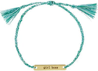 Turquoise braided bracelet with gold charm and tassels, ideal for women’s boho chic clothing