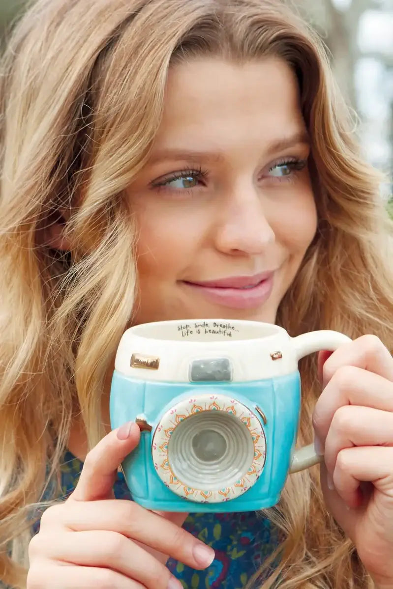 Turquoise and cream camera mug featuring lens design from Shop Daisy for boho chic lifestyle