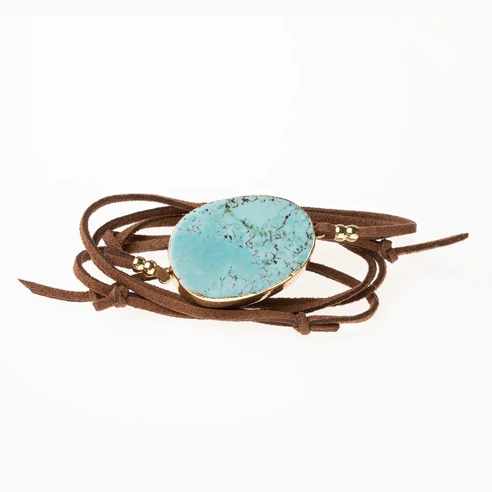 Turquoise stone pendant on brown leather wrap cord for a convertible bohemian bracelet