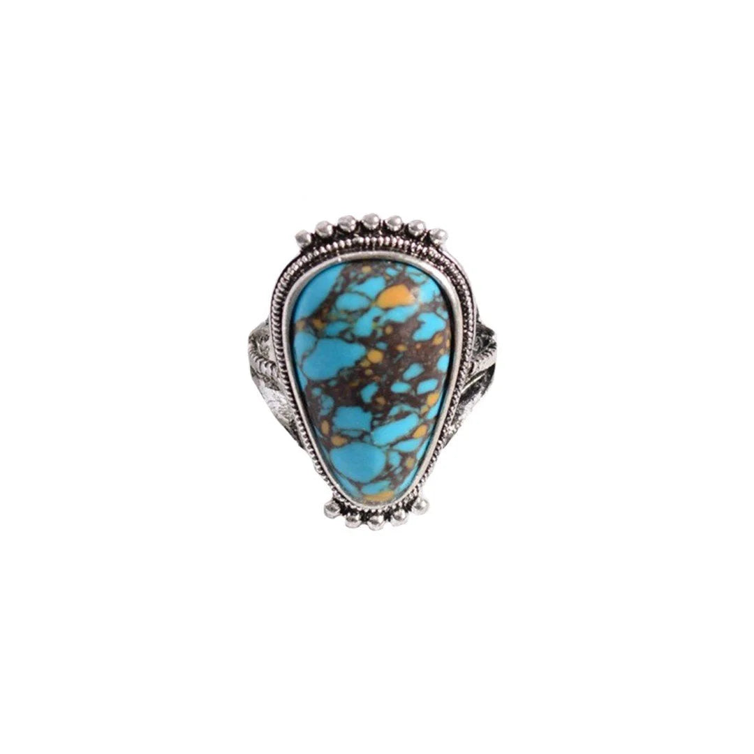 Turquoise stone ring with silver band from the Turquoise Raindrop Adjustable Ring collection