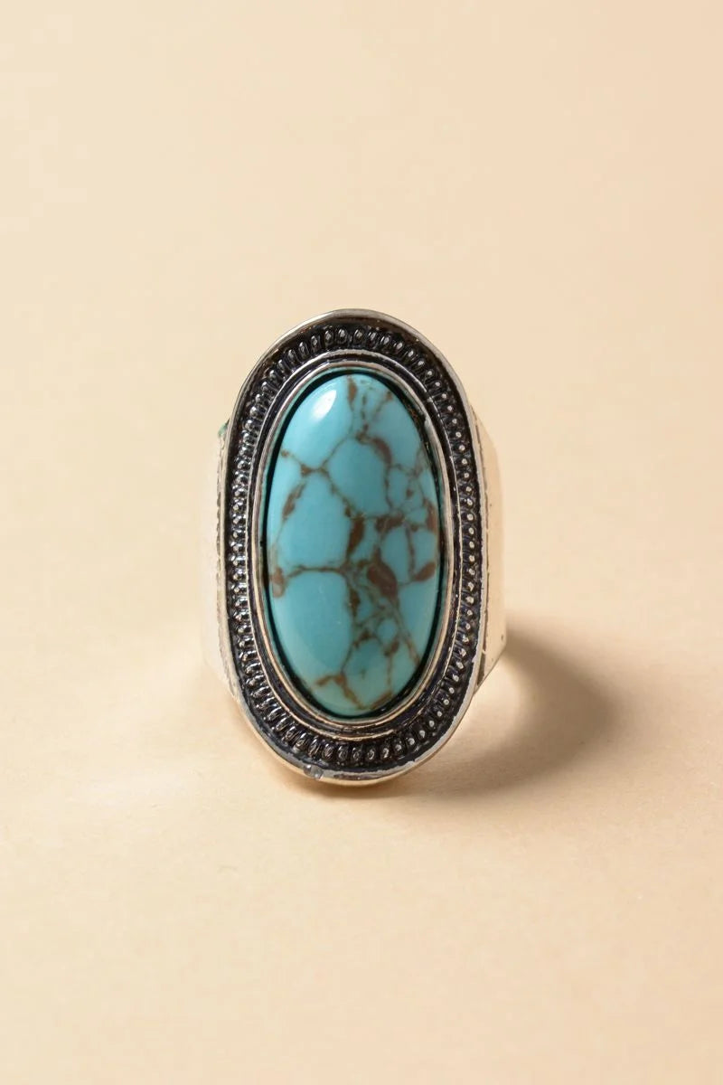 Vintage Turquoise Ring featuring a turquoise stone with a black diamond band