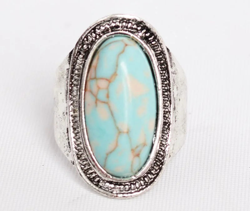 Turquoise stone ring in silver frame labeled as Vintage Turquoise Ring for sale