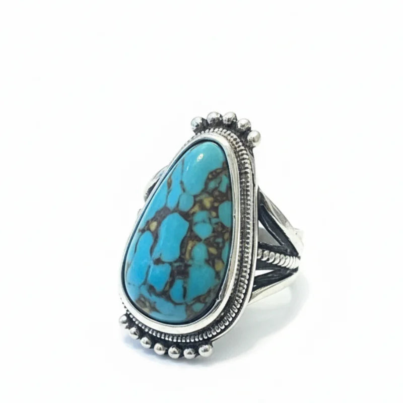 Chunky turquoise adjustable statement ring with silver detailing