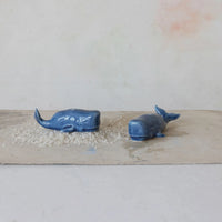 Two blue whales illustrated on paper for WHALE SALT & PEPPER SHAKERS design