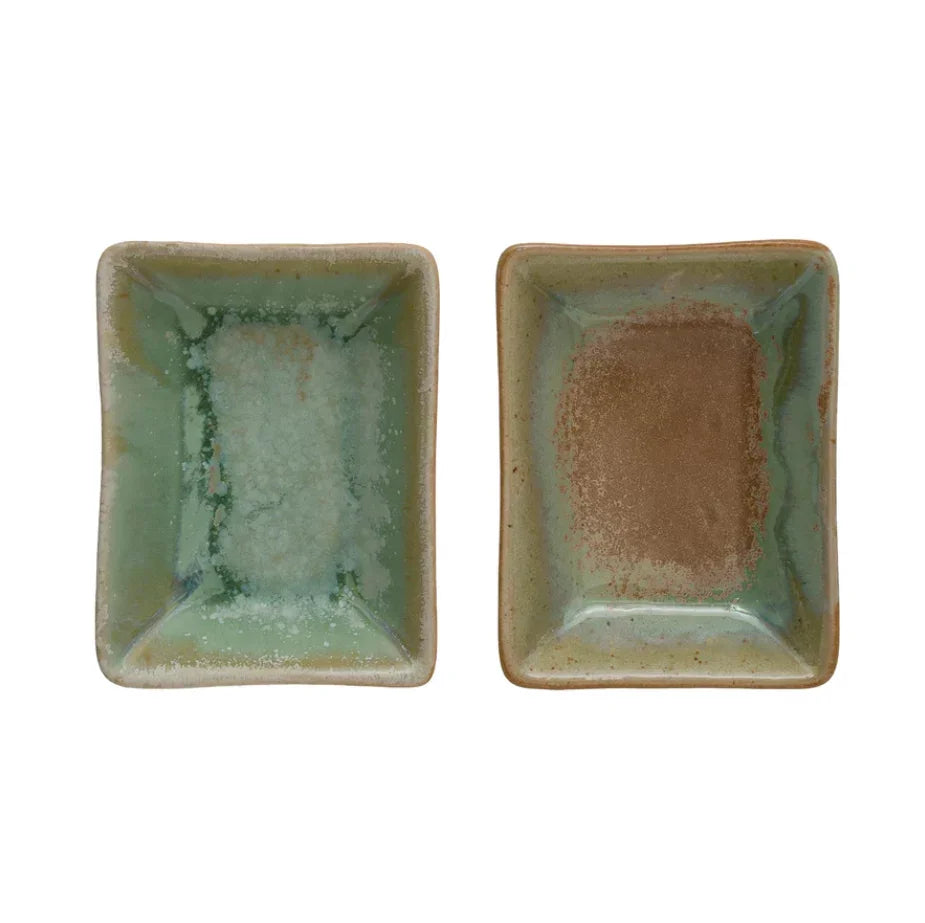 Two stoneware dishes with opal reactive glaze in muted green and brown tones