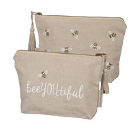 Two small bags featuring bee print from the BEE YOU TIFUL ZIPPER POUCH collection