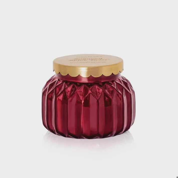 Vibrant red faceted glass jar with gold scalloped lid for CAPRI BLUE SIGNATURE ROYAL GEM sugared spice candle