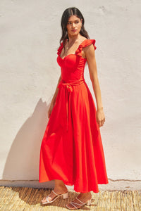 Vibrant red corset flutter dress with ruffled shoulder straps and tie waist detail