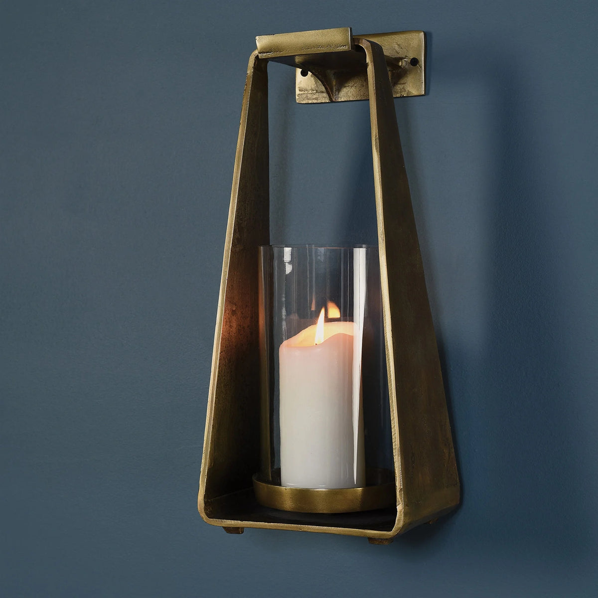 Boho Wall-mounted brass lantern with glass cylinder and lit candle - TAYLOR SCONCE