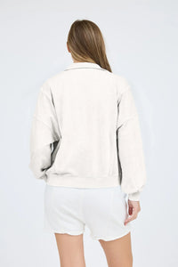 Off-white washed half snap long sleeve knit top with matching shorts for casual wear