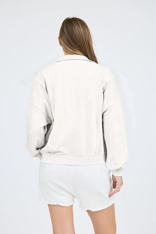 Off-white washed half snap long sleeve knit top with matching shorts for casual wear