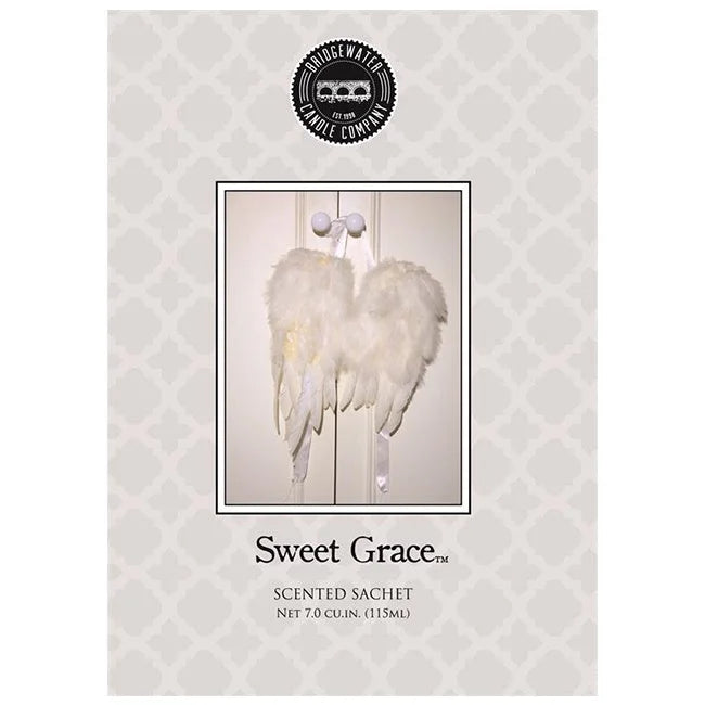 White angel wings on a wall near Scented Sachets Sweet Grace for elegant decor