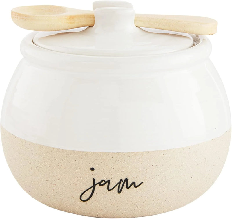 White and beige stoneware jam jar with lid, featuring ’jam’ label for stylish storage