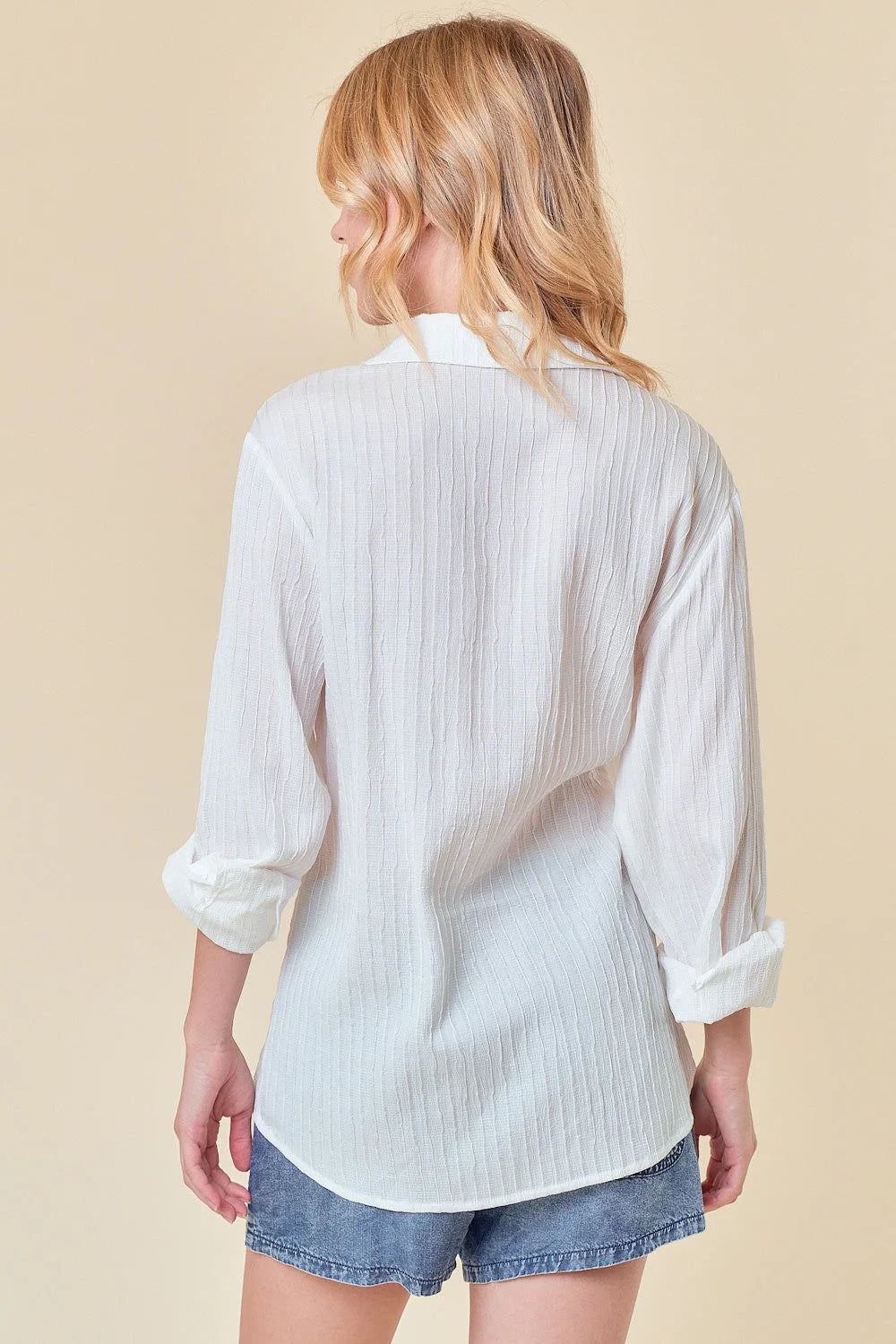 White Textured Point Collar Wrap Top showcasing elegant design and versatile style